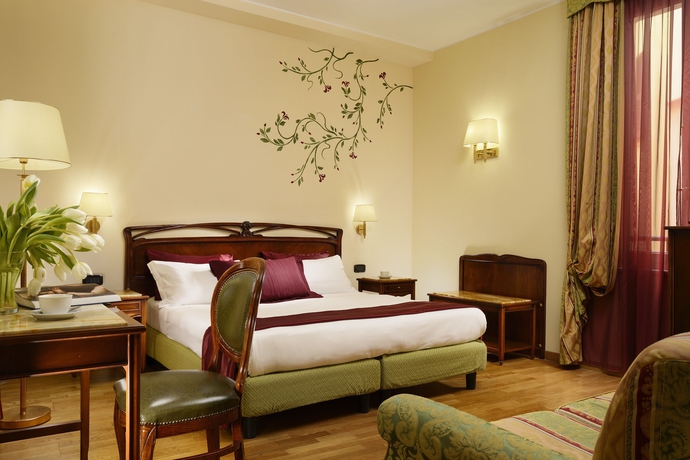 Imagen de la habitación del Hotel Continental Genova. Foto 7