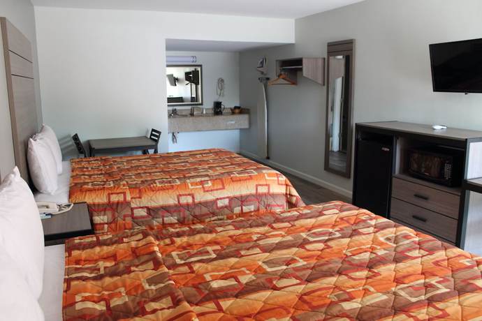 Imagen de la habitación del Hotel Continental Inn And Suites. Foto 4