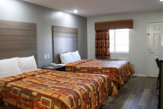 Imagen de la habitación del Hotel Continental Inn And Suites. Foto 11