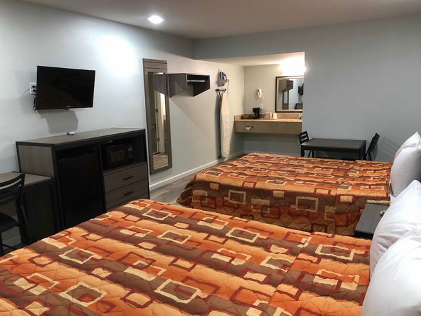 Imagen de la habitación del Hotel Continental Inn And Suites. Foto 16