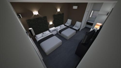 Imagen de la habitación del Hotel Continental Inn and Suites. Foto 7