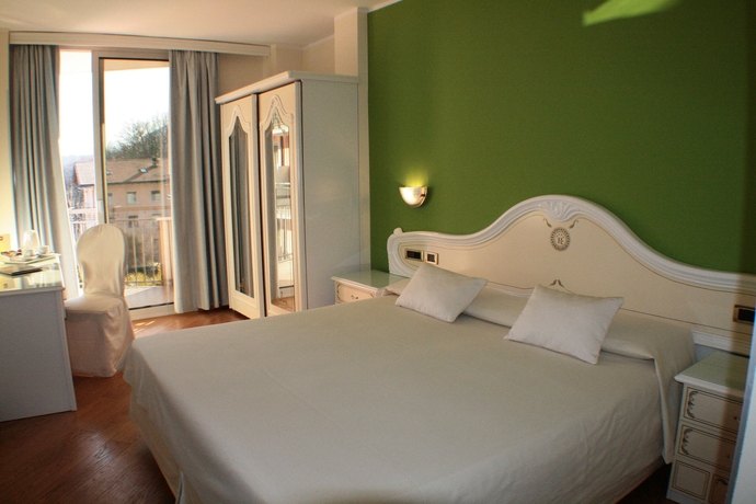 Imagen de la habitación del Hotel Continental - Tonellihotels. Foto 11