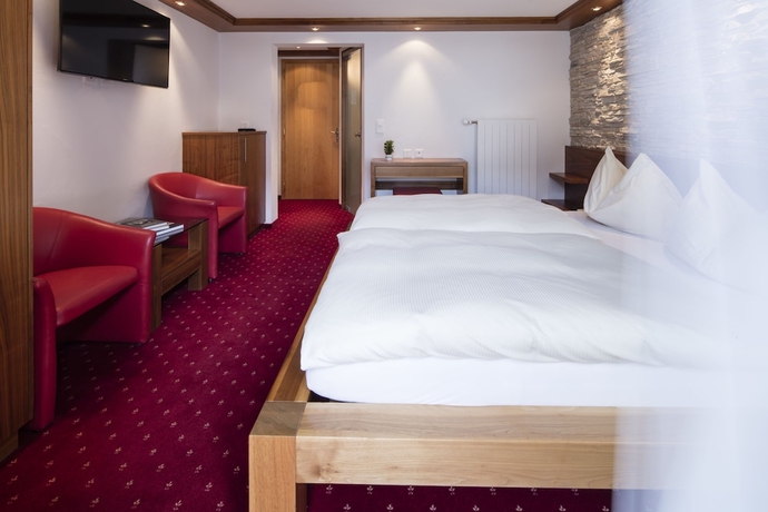 Imagen de la habitación del Hotel Continental, Zermatt . Foto 10