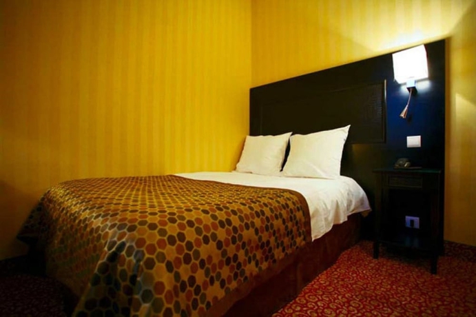 Imagen de la habitación del Hotel Convention Montparnasse. Foto 10