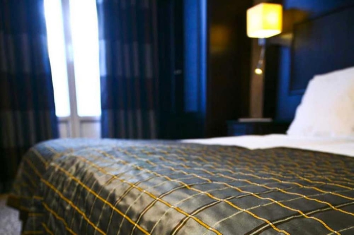 Imagen de la habitación del Hotel Convention Montparnasse. Foto 12