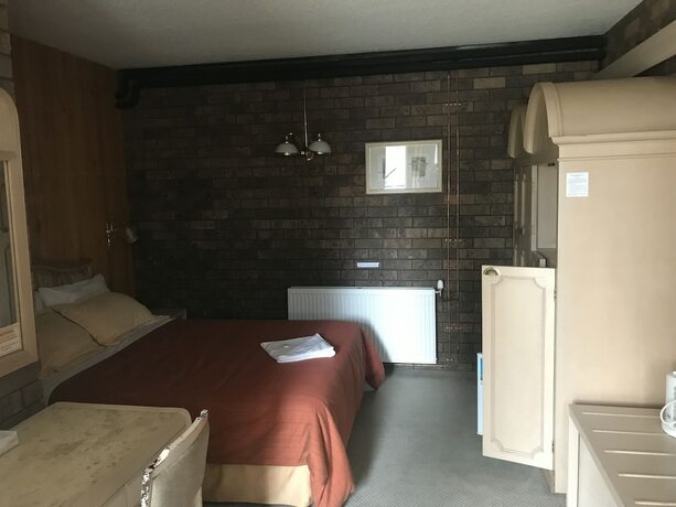 Imagen de la habitación del Hotel Cooba Holiday Motel. Foto 14