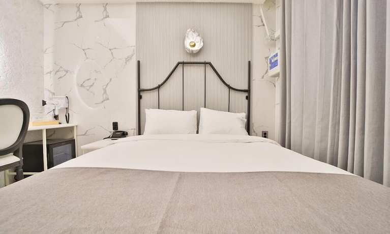 Imagen de la habitación del Hotel Coolstay Lions Park. Foto 15