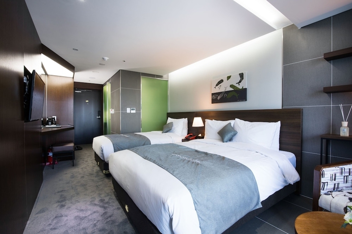 Imagen de la habitación del Hotel Co-op City Harborview. Foto 3