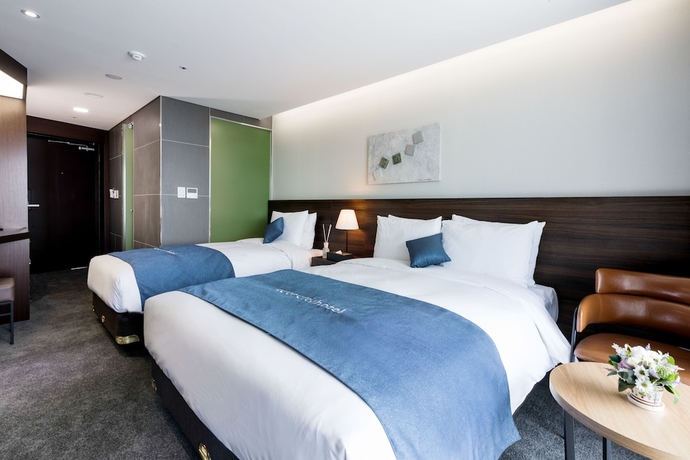Imagen de la habitación del Hotel Co-op City Harborview. Foto 5