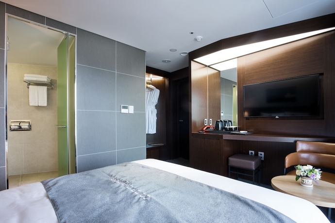 Imagen de la habitación del Hotel Co-op City Harborview. Foto 7