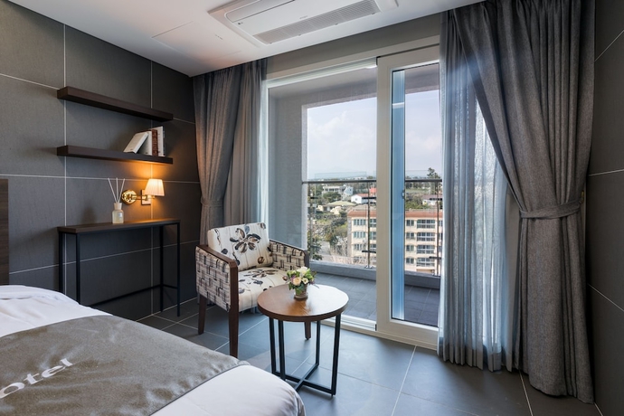 Imagen de la habitación del Hotel Co-op City Harborview. Foto 8