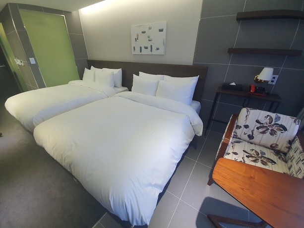 Imagen de la habitación del Hotel Co-op City Harborview. Foto 9