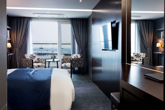 Imagen de la habitación del Hotel Co-op City Harborview. Foto 16