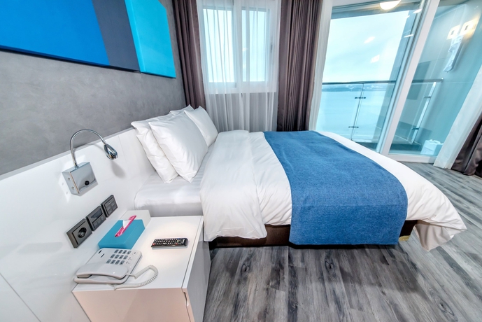 Imagen de la habitación del Hotel Co-op City Seongsan. Foto 6