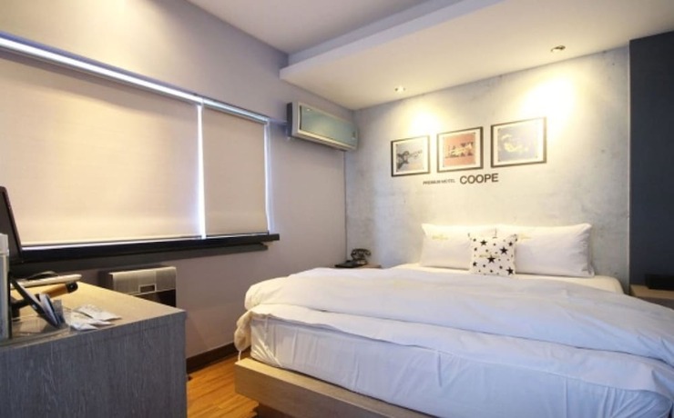 Imagen de la habitación del Hotel Coope Noman Motel. Foto 13