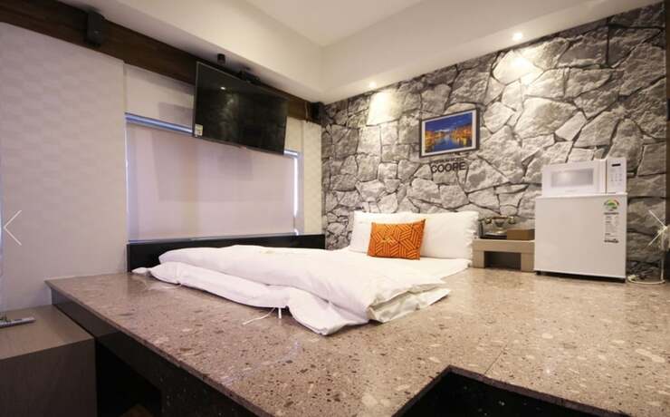 Imagen de la habitación del Hotel Coope Noman Motel. Foto 16