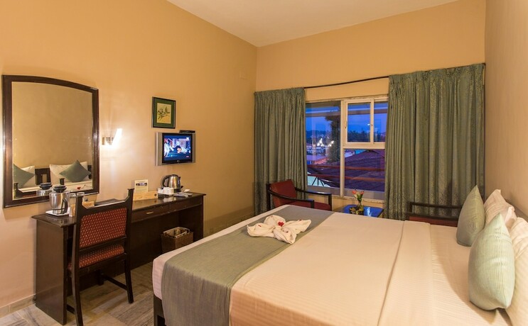 Imagen de la habitación del Hotel Coorg International. Foto 26