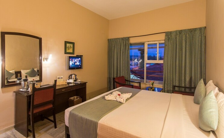 Imagen de la habitación del Hotel Coorg International. Foto 30