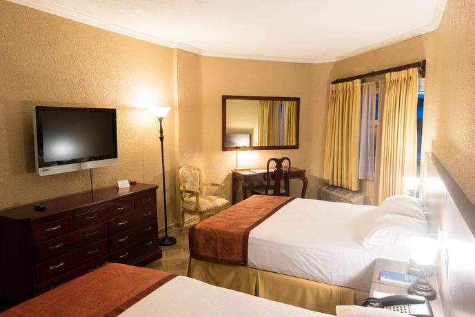 Imagen de la habitación del Hotel Copantl and Convention Center. Foto 6