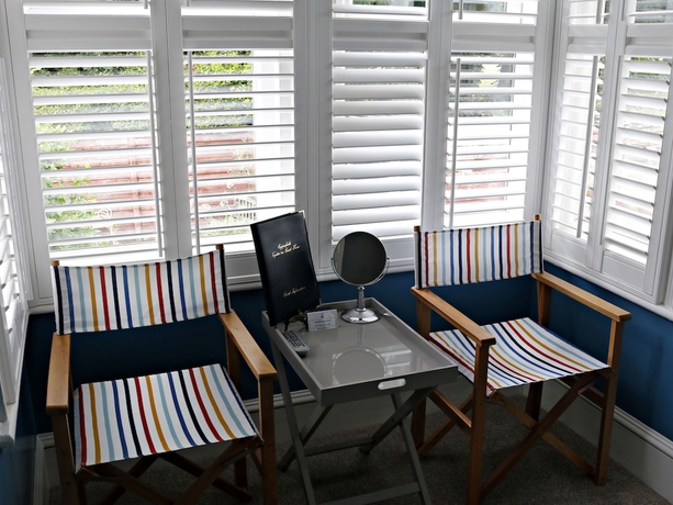 Imagen de la habitación del Hotel Copperfields Vegetarian Guest House. Foto 7