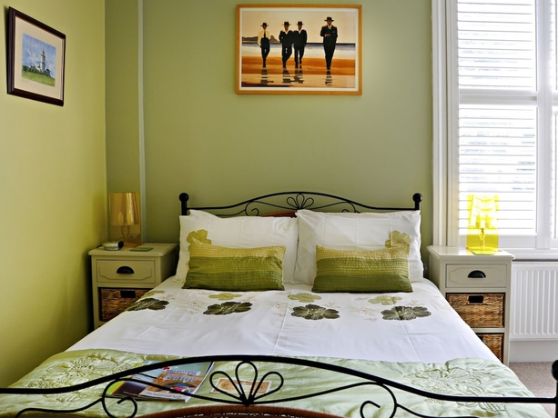 Imagen de la habitación del Hotel Copperfields Vegetarian Guest House. Foto 8