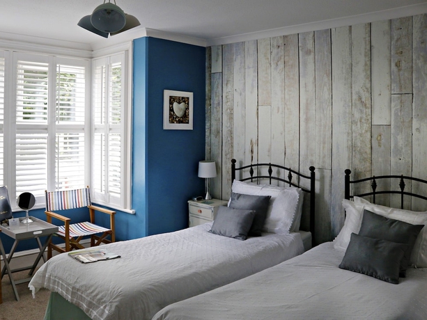 Imagen de la habitación del Hotel Copperfields Vegetarian Guest House. Foto 10