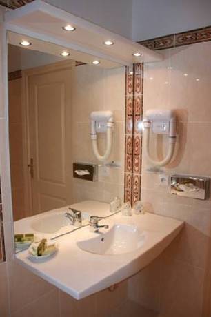 Imagen de la habitación del Hotel Coq. Foto 13