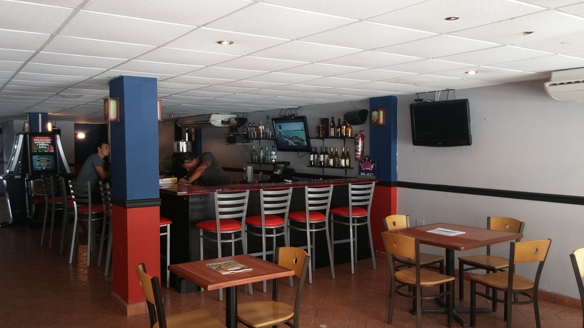 Imagen del bar/restaurante del Hotel Coqui Inn. Foto 3