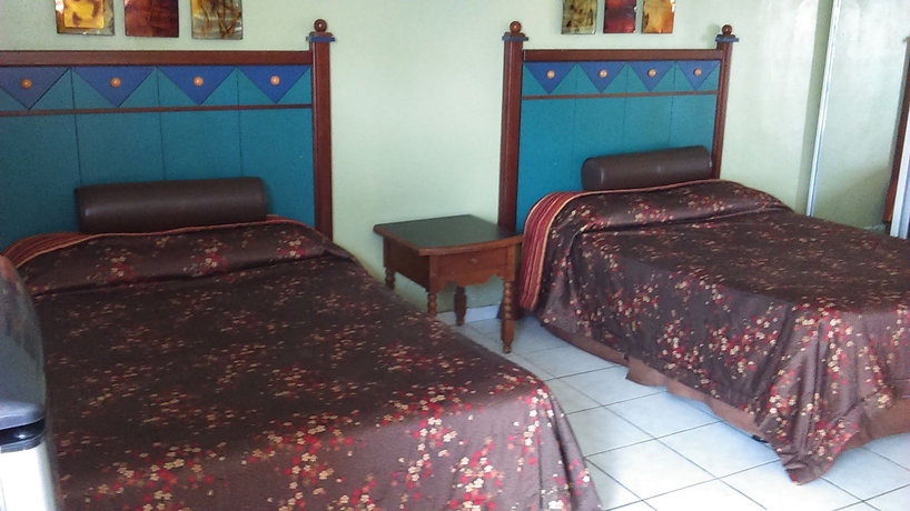 Imagen de la habitación del Hotel Coqui Inn. Foto 6