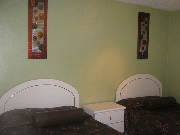 Imagen de la habitación del Hotel Coqui Inn. Foto 8