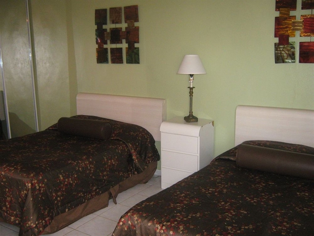 Imagen de la habitación del Hotel Coqui Inn. Foto 10