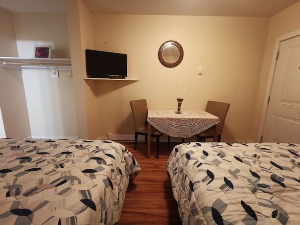 Imagen de la habitación del Hotel Coquihalla Motel. Foto 19