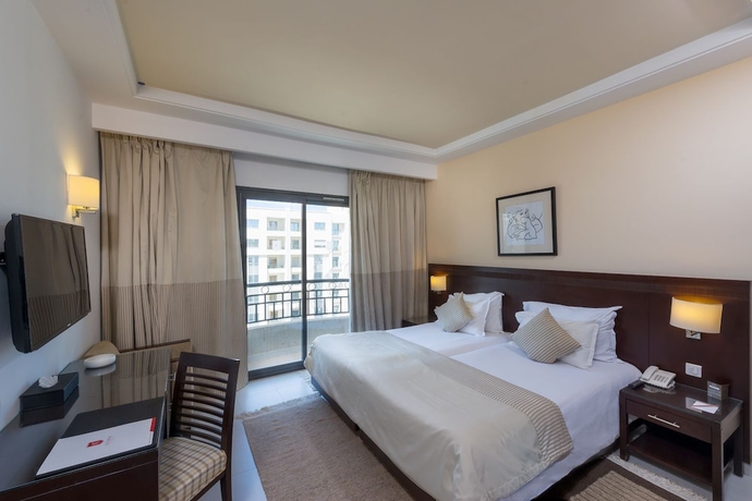 Imagen de la habitación del Hotel Corail Suites. Foto 7