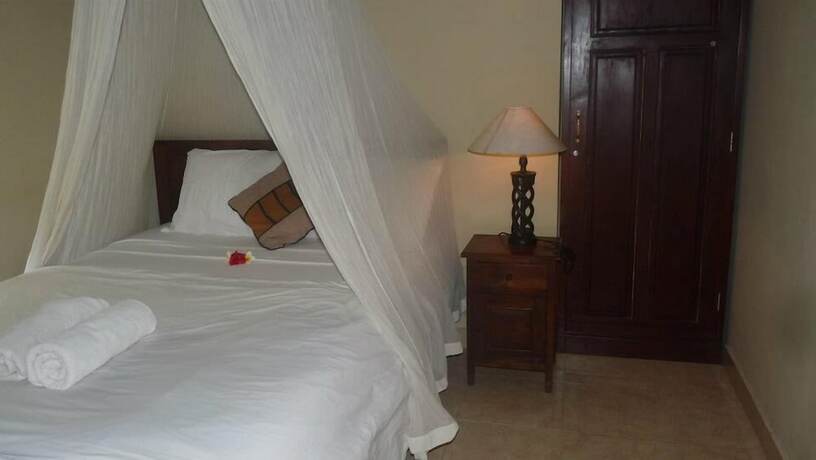 Imagen de la habitación del Hotel Coral Bay Bungalow. Foto 16