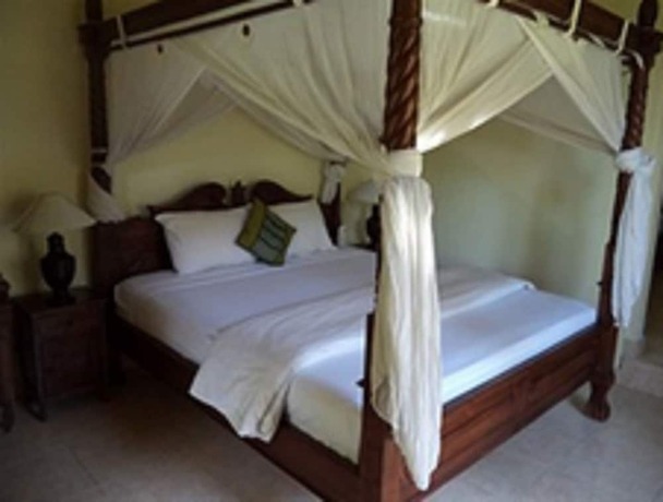 Imagen de la habitación del Hotel Coral Bay Bungalow. Foto 20