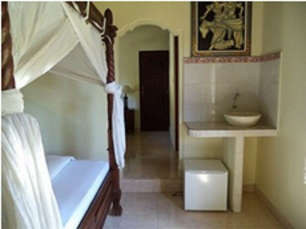 Imagen de la habitación del Hotel Coral Bay Bungalow. Foto 21