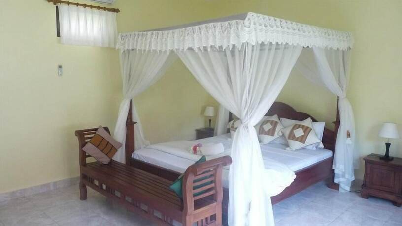 Imagen de la habitación del Hotel Coral Bay Bungalow. Foto 23