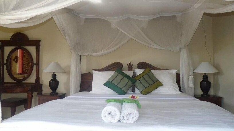 Imagen de la habitación del Hotel Coral Bay Bungalow. Foto 25