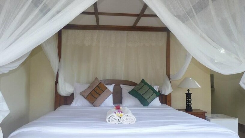 Imagen de la habitación del Hotel Coral Bay Bungalow. Foto 29