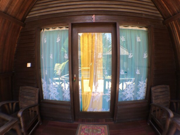 Imagen de la habitación del Hotel Coral Beach 2 Bungalow. Foto 20