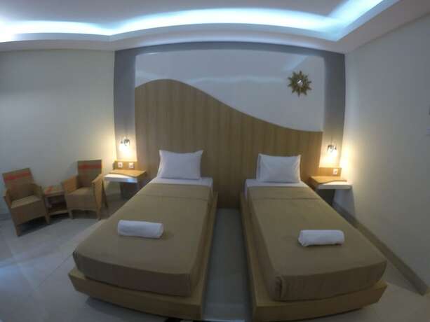 Imagen de la habitación del Hotel Coral Beach 2 Bungalow. Foto 22