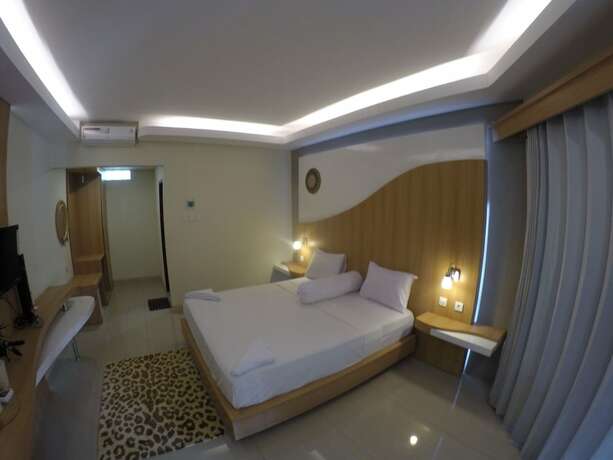 Imagen de la habitación del Hotel Coral Beach 2 Bungalow. Foto 27