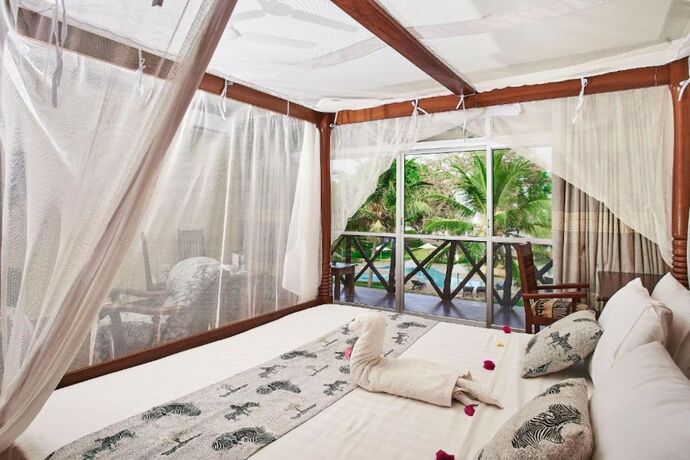 Imagen de la habitación del Hotel Coral Beach Resort, Playa Diani. Foto 18