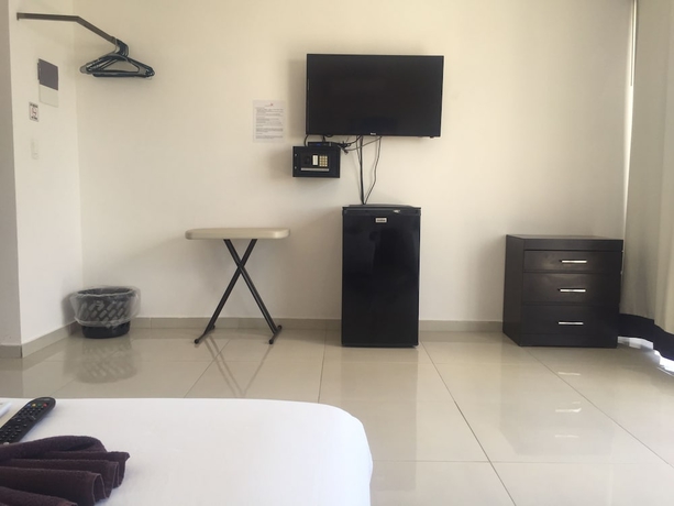 Imagen de la habitación del Hotel Coral Blue Beach Condo. Foto 5