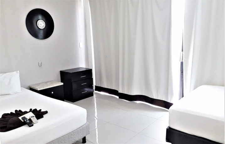 Imagen de la habitación del Hotel Coral Blue Beach Condo. Foto 6