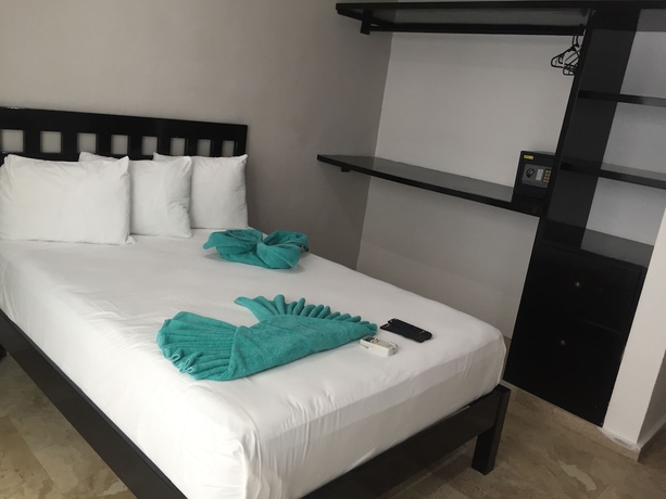 Imagen de la habitación del Hotel Coral Blue Beach Condo. Foto 8