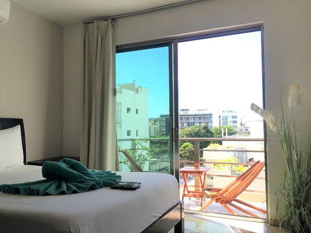 Imagen de la habitación del Hotel Coral Blue Beach Condo. Foto 9