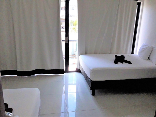 Imagen de la habitación del Hotel Coral Blue Beach Condo. Foto 10