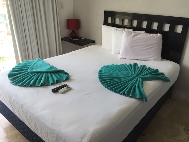 Imagen de la habitación del Hotel Coral Blue Beach Condo. Foto 12