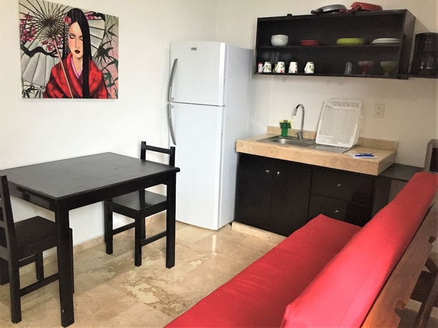 Imagen de la habitación del Hotel Coral Blue Beach Condo. Foto 13